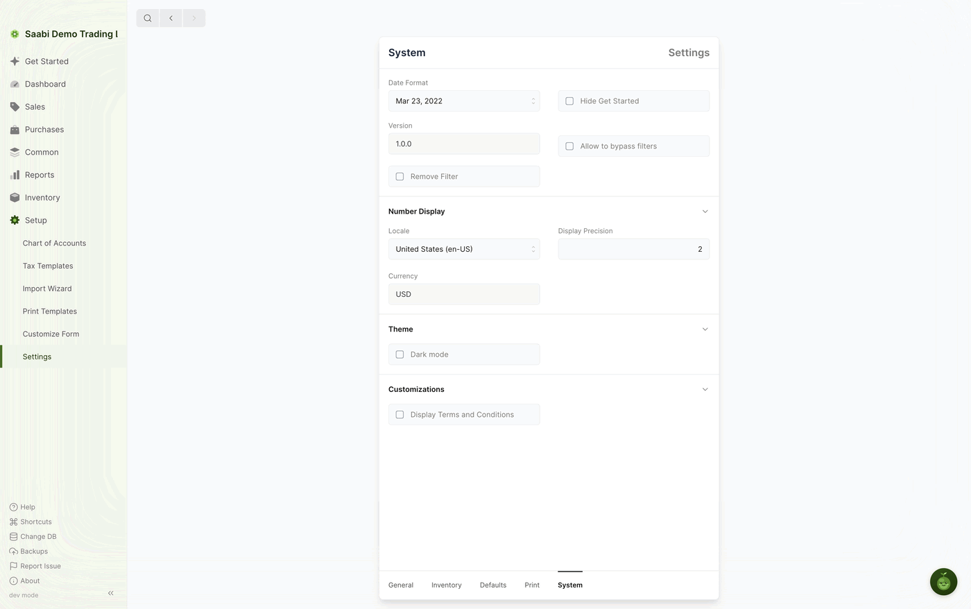 The System tab, holding the date format, the read-only version, number display, theme and one print customisation